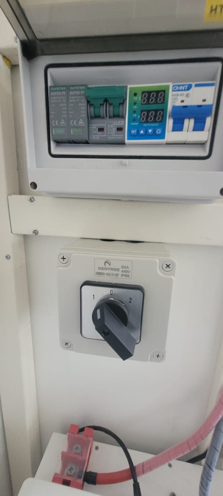 Protection box with surge protection and breakers above a 63 amp rotary changeover switch